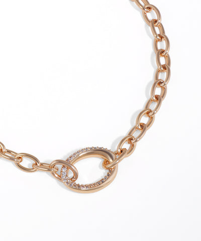 Rose gold chain bracelet with a clasp on a white background