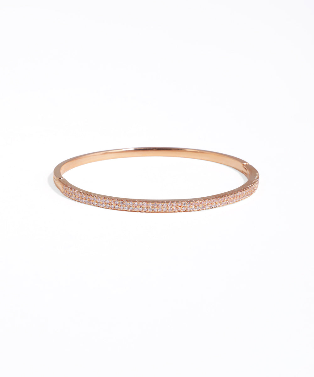 Rose gold bracelet on a white background