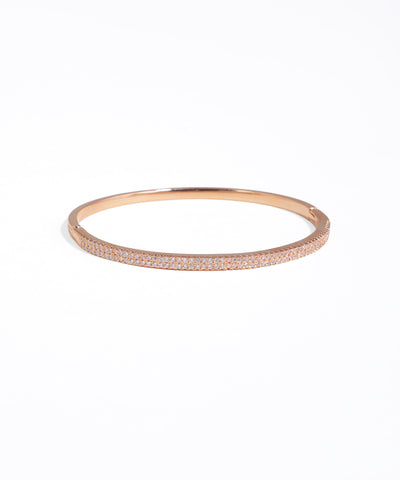 Rose gold bracelet on a white background