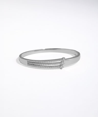 Silver bracelet with small stones on a white background