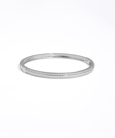 Silver bangle on a white background