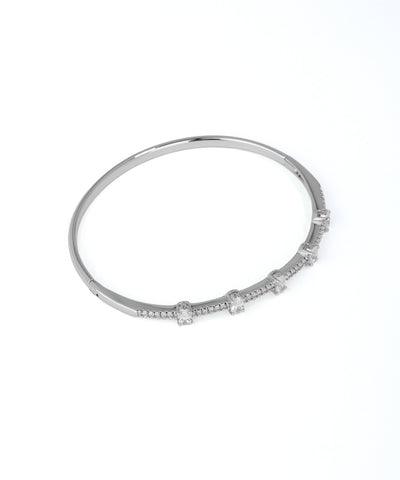 Silver bracelet with small diamonds on a white background