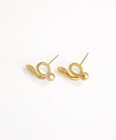 Gold earrings on a white background