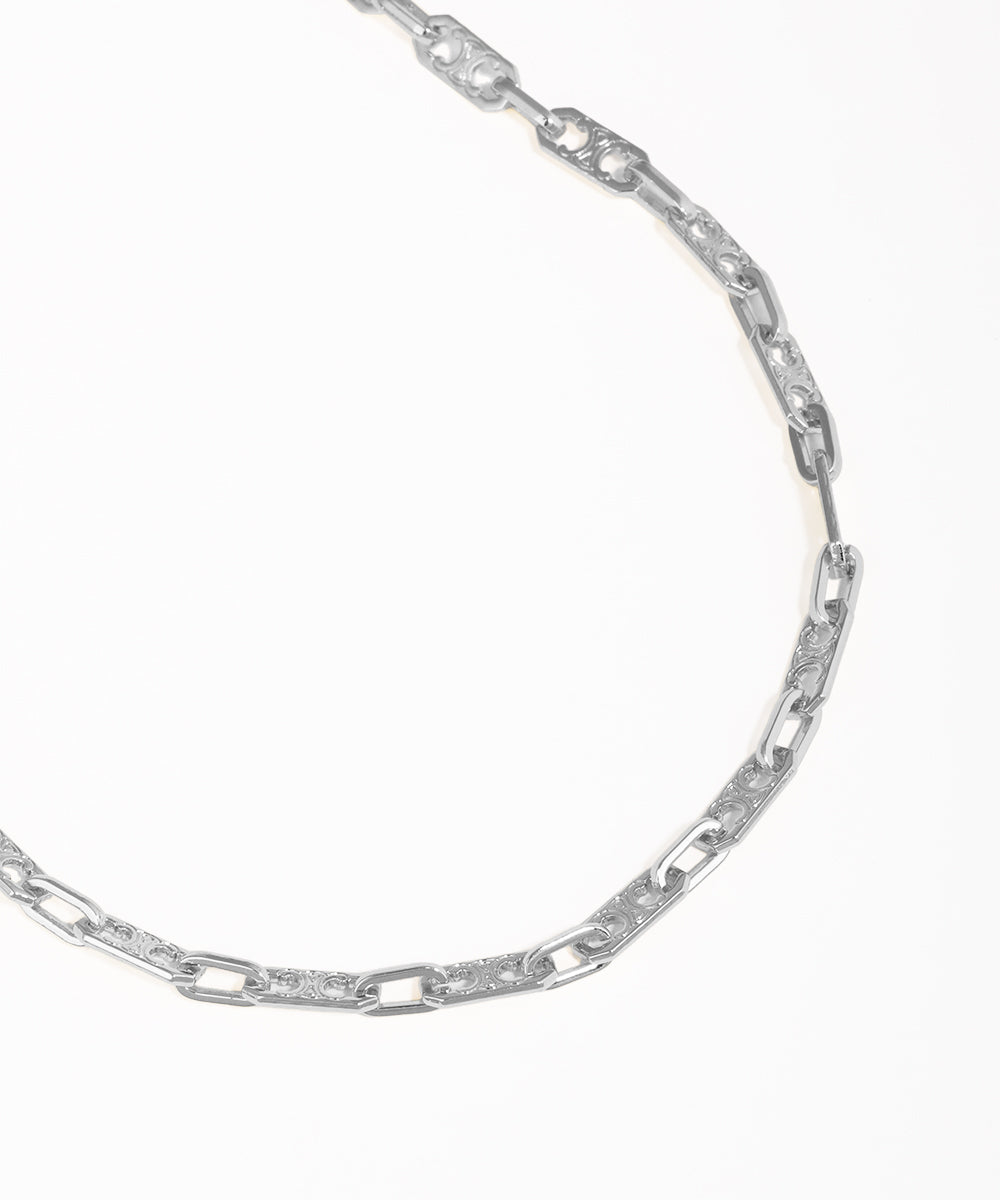 Silver chain necklace on a white background