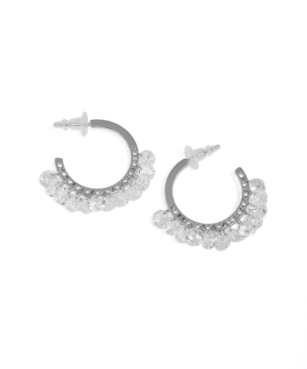 Rhodium finish hoop earrings with clear cubic zirconia fringe drops and push back closure.