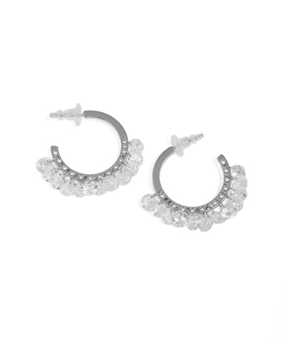 Rhodium finish hoop earrings with clear cubic zirconia fringe drops and push back closure.
