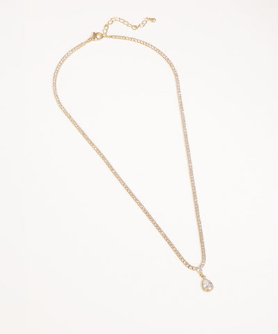 Gold-tone necklace with continuous clear stones and a teardrop CZ pendant