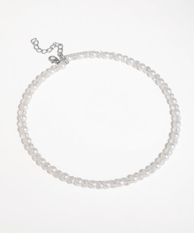 Silver-tone necklace with alternating white faux pearls and clear faceted glass crystals