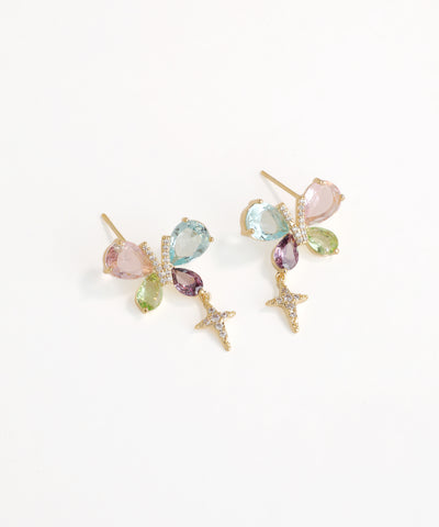 Multicolored gemstone earrings on a white background