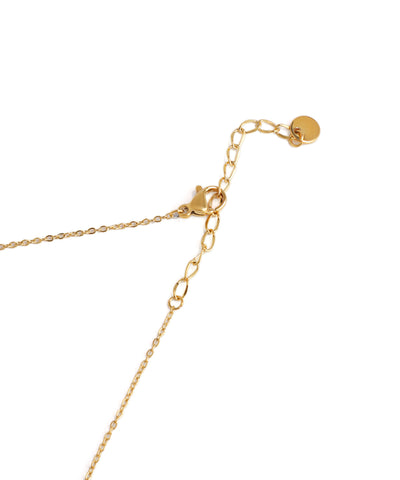 Gold chain necklace on a white background