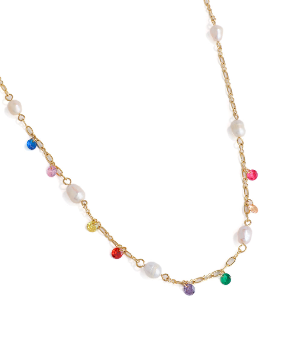 Necklace with multicolored beads on a gold chain against a white background