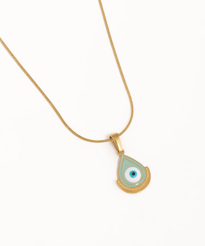 Necklace with a green teardrop pendant featuring an eye design on a white background