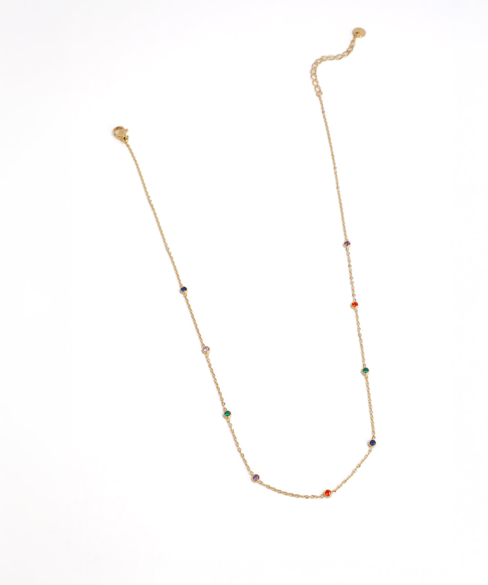 Necklace with small colored beads on a white background