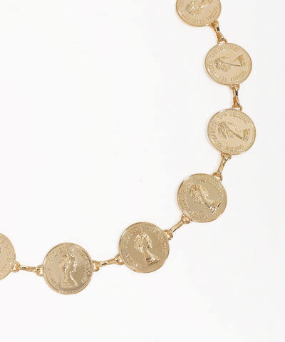 Gold necklace with coin-shaped pendants on a white background