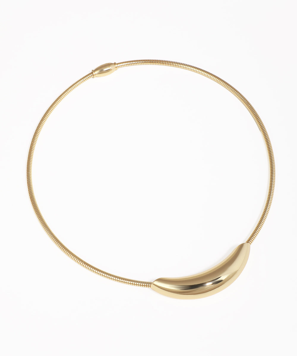 Gold-tone necklace with a smooth, curved bar design on a snake chain and magnetic closure