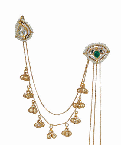 Gold necklace with pendant on a white background