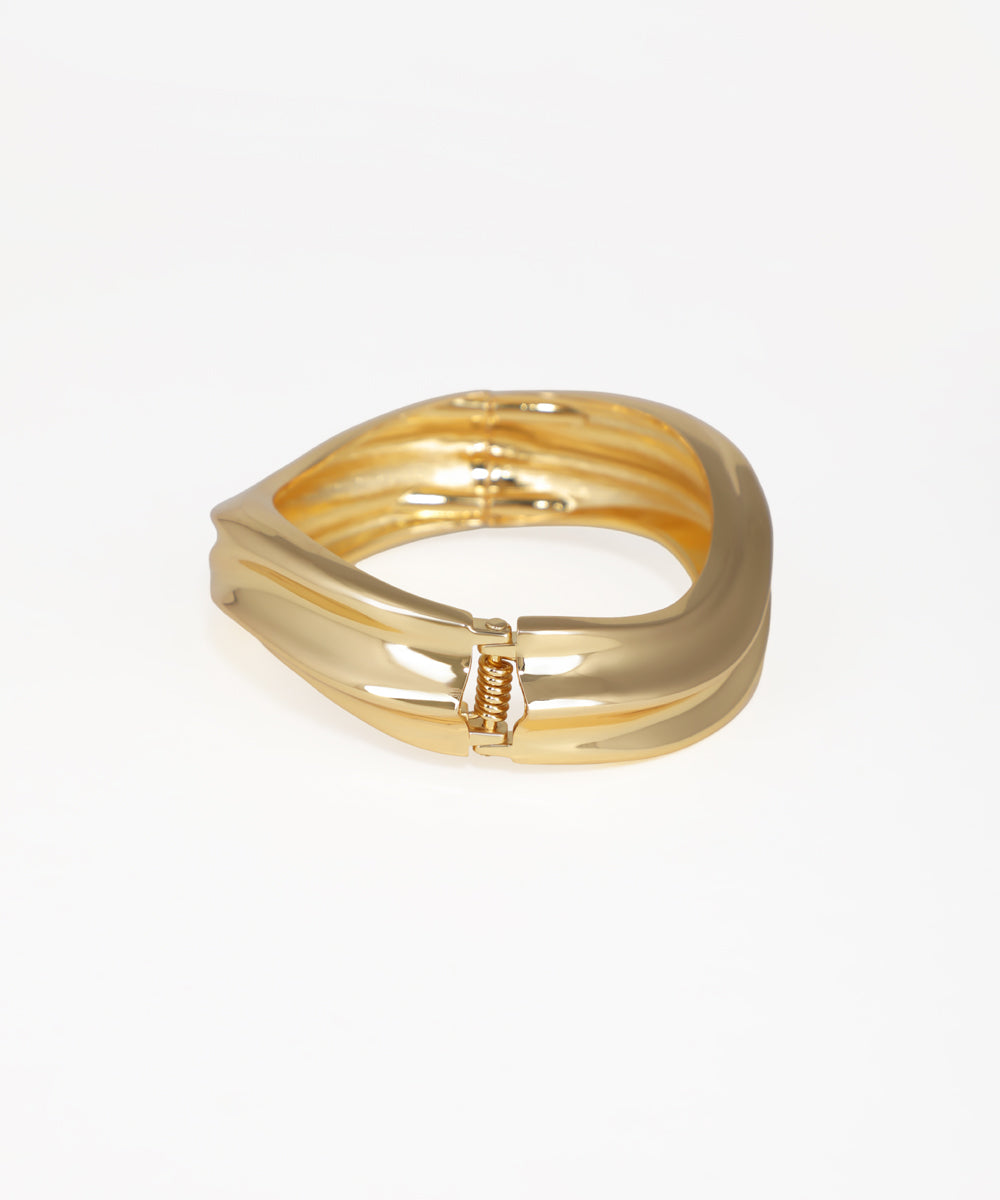 Gold ring on a white background