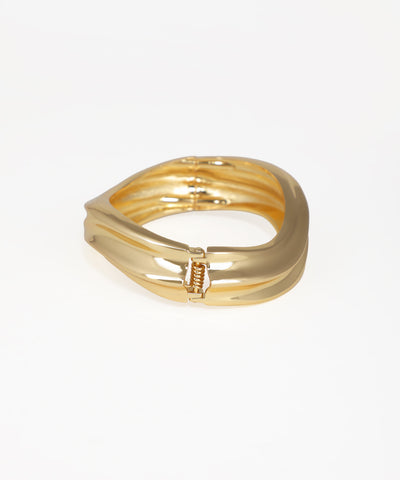 Gold ring on a white background