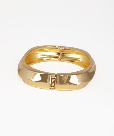 Gold ring on a white background