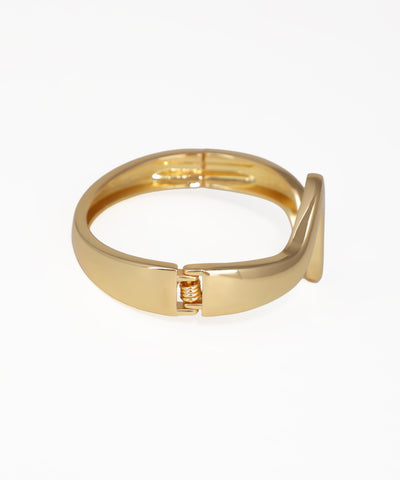 Gold ring on a white background
