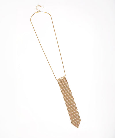 Gold beaded necklace on a white background