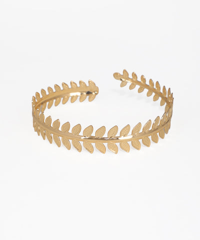 Gold leaf-patterned headband on a white background