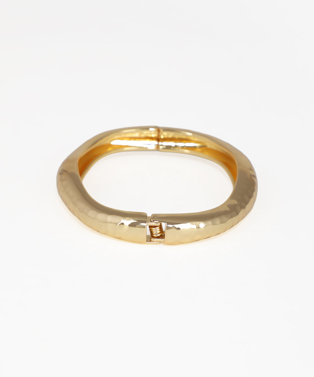 Gold ring on a white background