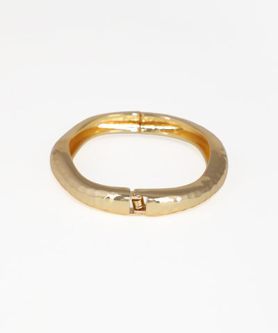 Gold ring on a white background