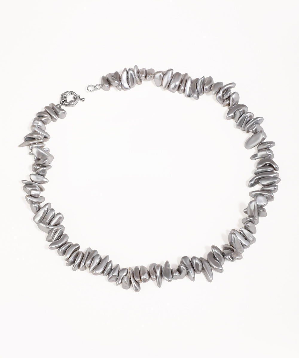 Silver necklace on a white background