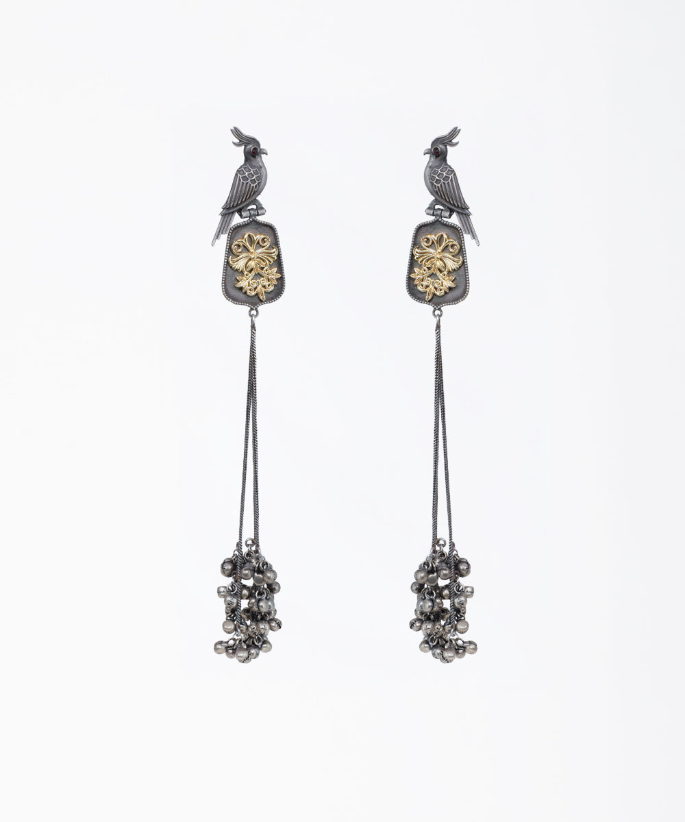 Oxidized and gold-tone drop earrings with bird motif and ghungroo clusters