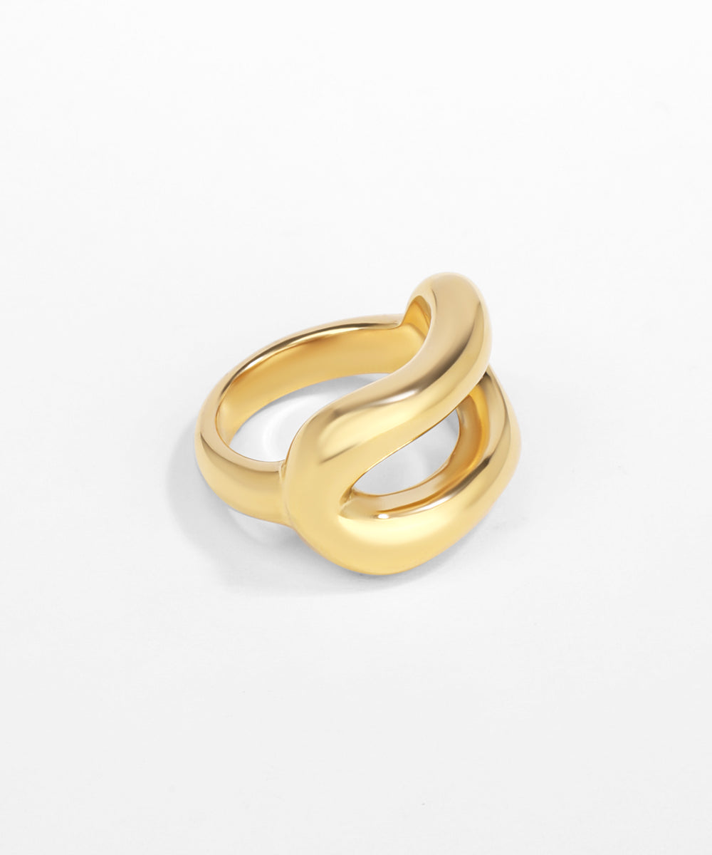 Gold ring on a white background