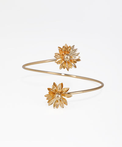 Gold-tone arm cuff with sculpted floral blossoms on each end