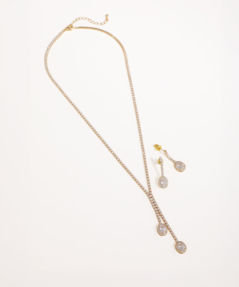 Gold-tone necklace set with brilliant stone Y-drop design and matching oval drop earrings