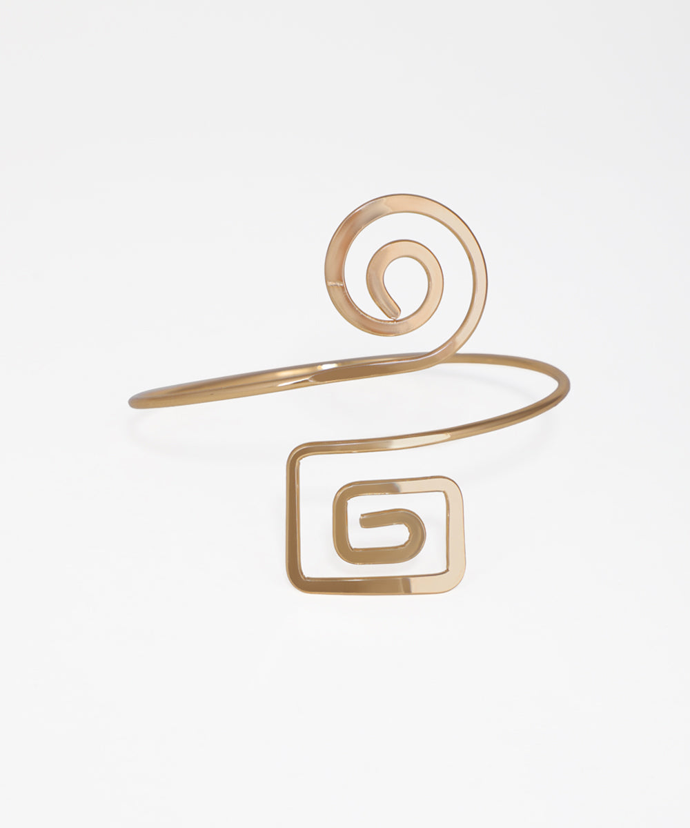 Gold-tone arm cuff with one curved and one angular spiral design