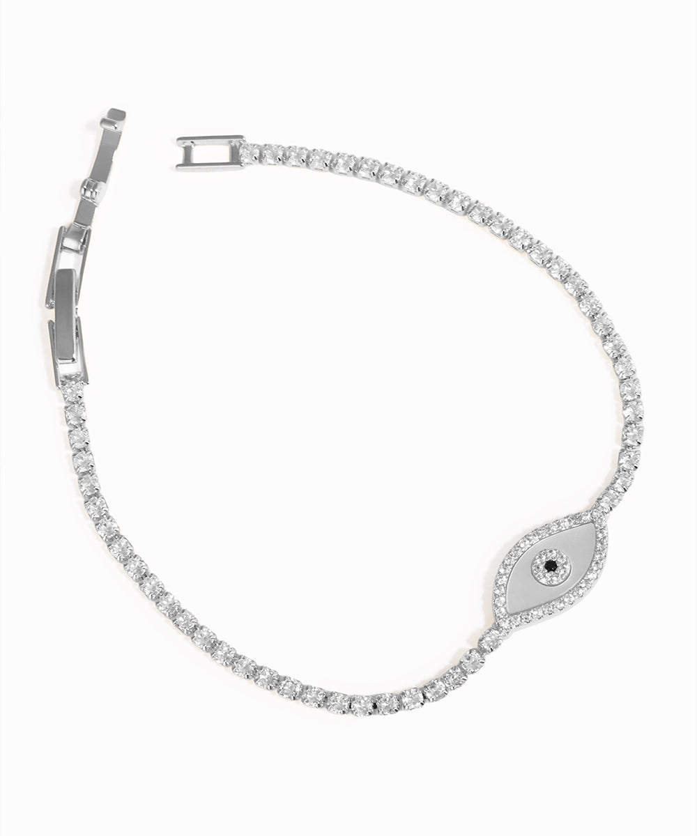 Silver bracelet with diamond accents on a white background