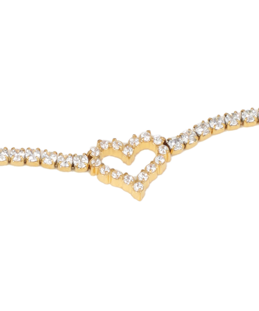 Gold bracelet with heart design and clear stones on a white background