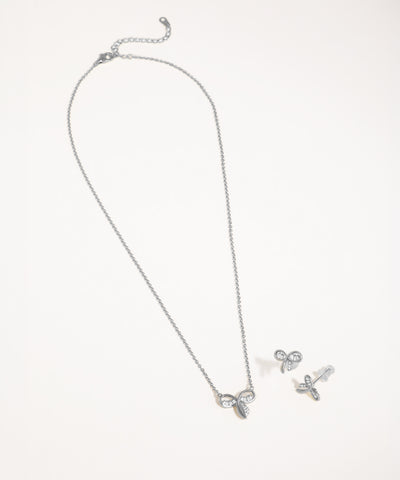 Silver necklace and earrings set on a white background