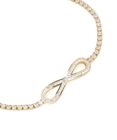 Gold bracelet with diamond infinity symbol on a white background