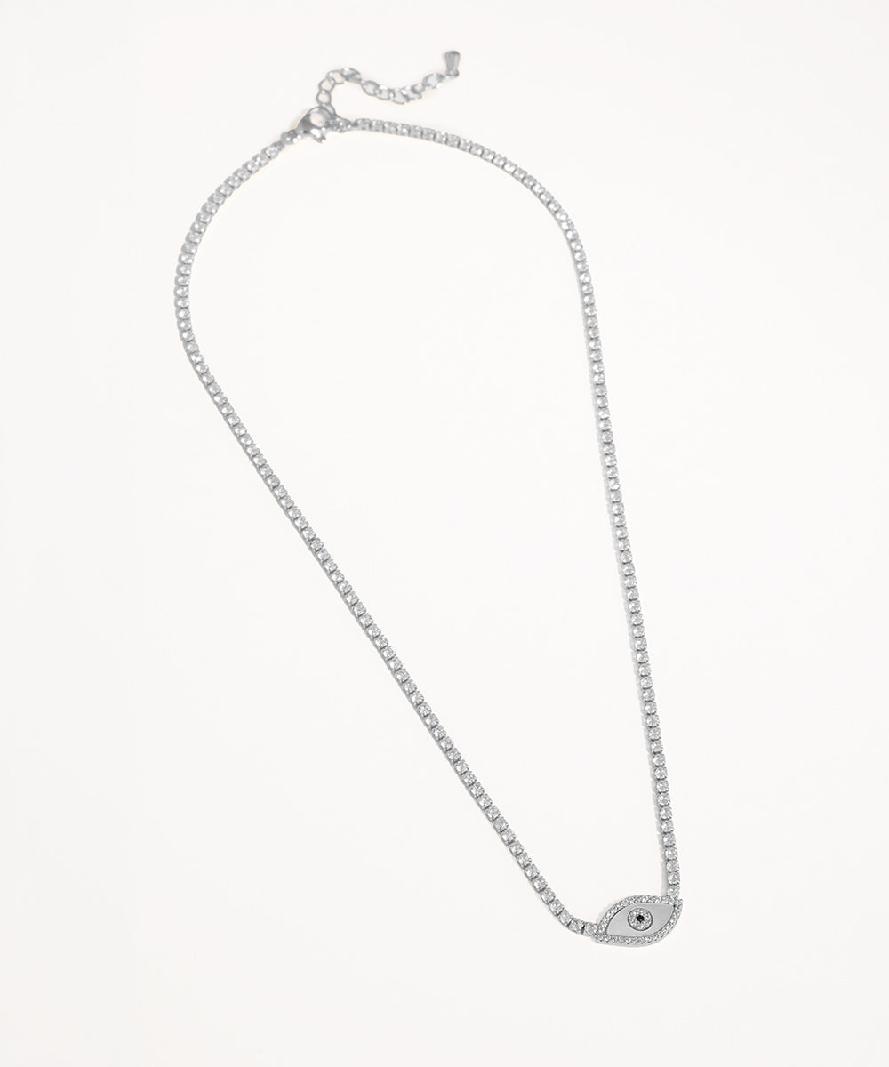 Silver necklace with a small pendant on a white background