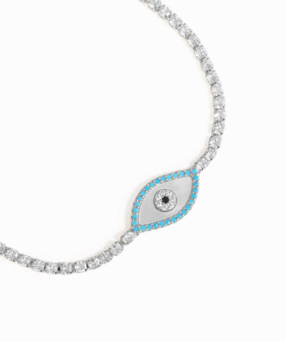 Necklace with a eye-shaped pendant featuring blue accents on a white background