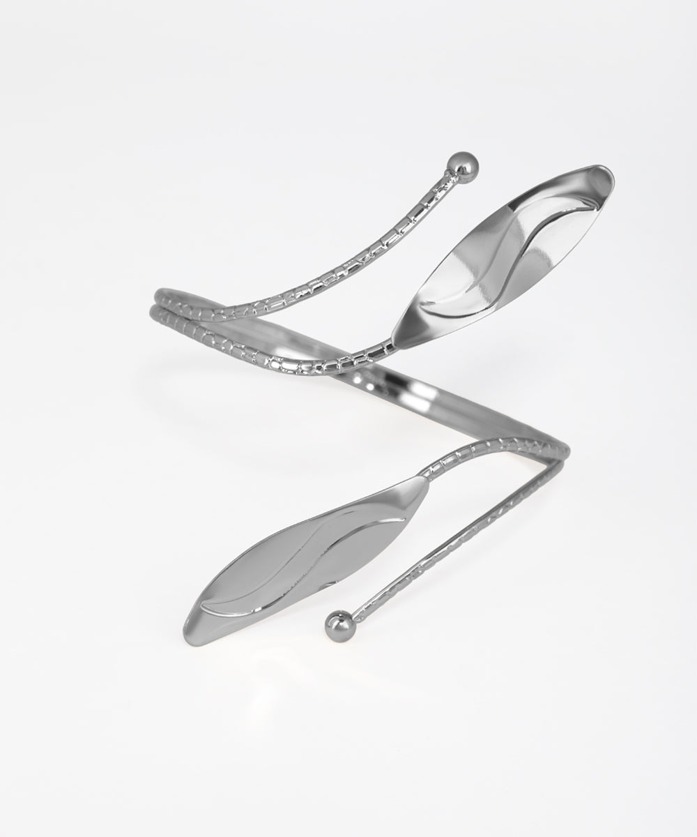 Silver bracelet with a unique design on a white background