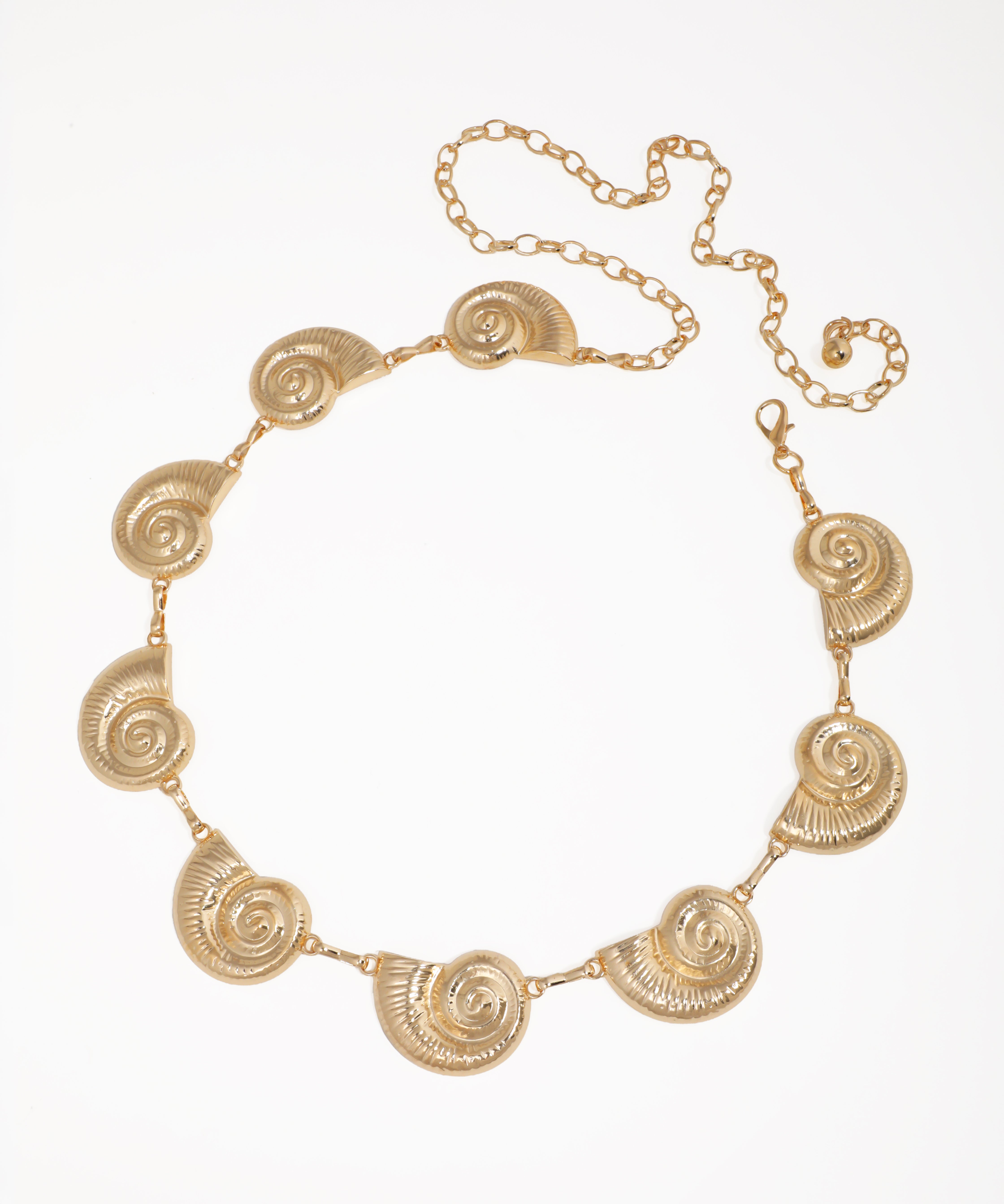 Gold-tone waist chains with detailed spiral shell medallions and adjustable lobster clasp closure