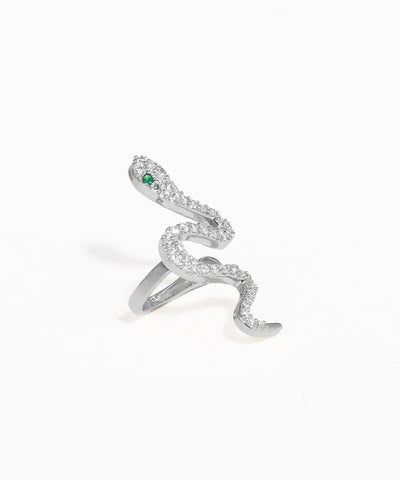 Silver snake-shaped ring with a green gemstone on a white background