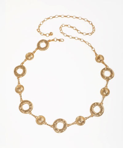 Gold necklace with circular links on a white background