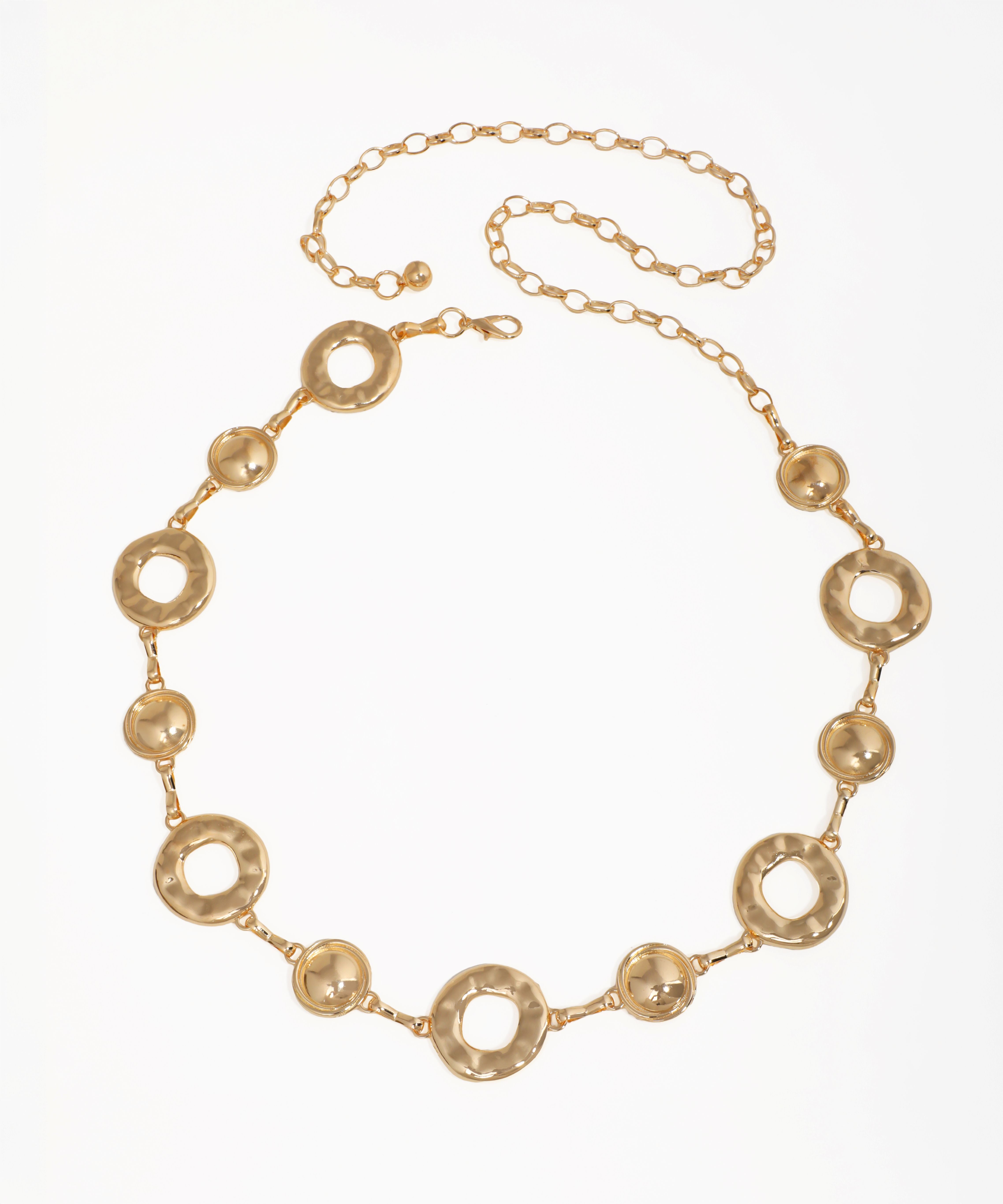 Gold necklace with circular links on a white background