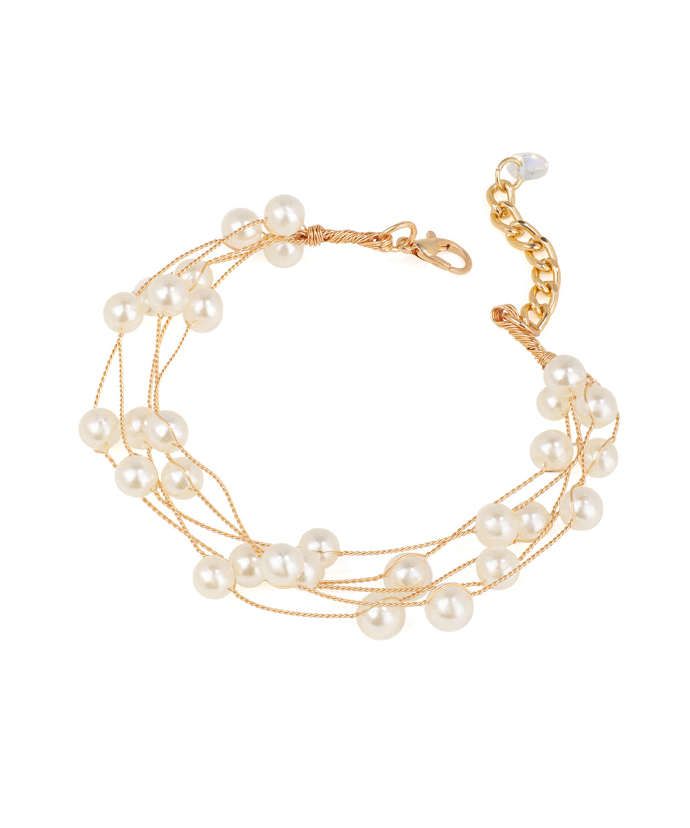 Gold-tone multi-strand bracelet with faux pearls