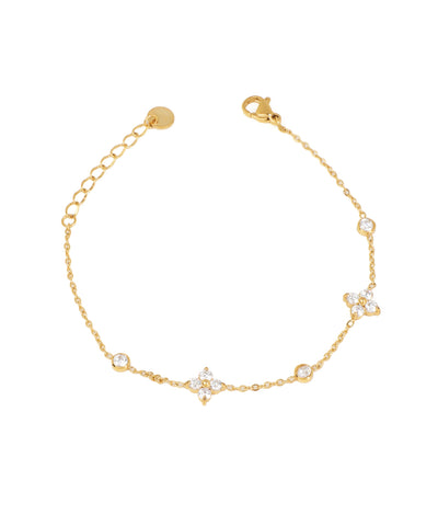 Gold-tone bracelet with delicate chain and sparkle floral clusters, interspersed with single round stones.
