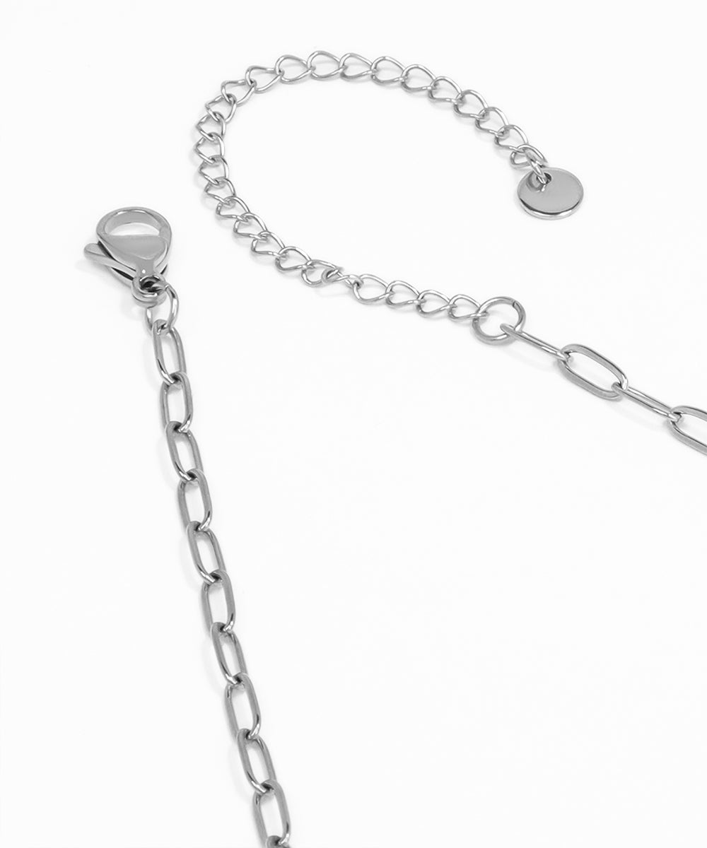 Silver chain with clasp on a white background