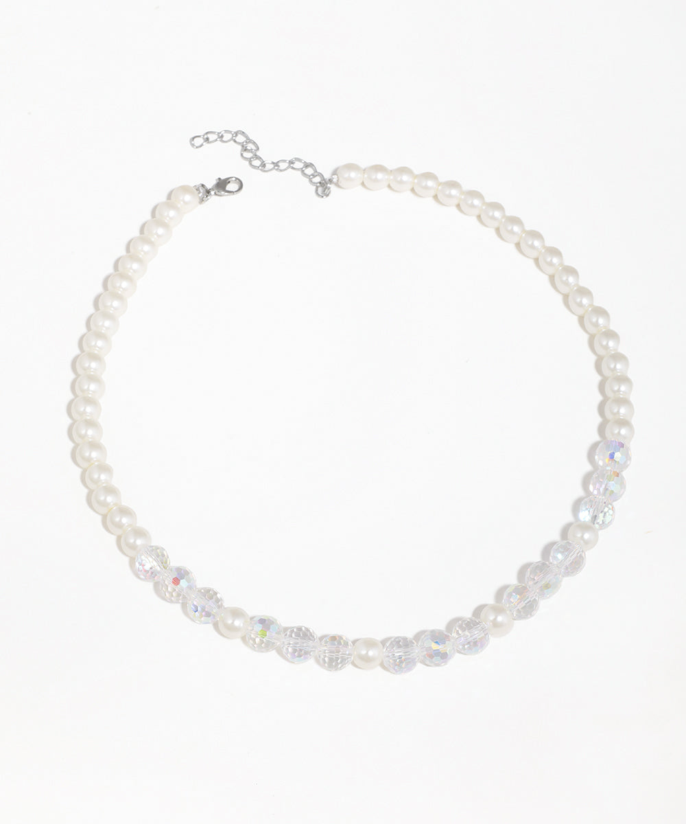 Rhodium finish necklace with alternating faux pearls and clear faceted glass crystals, lobster clasp.