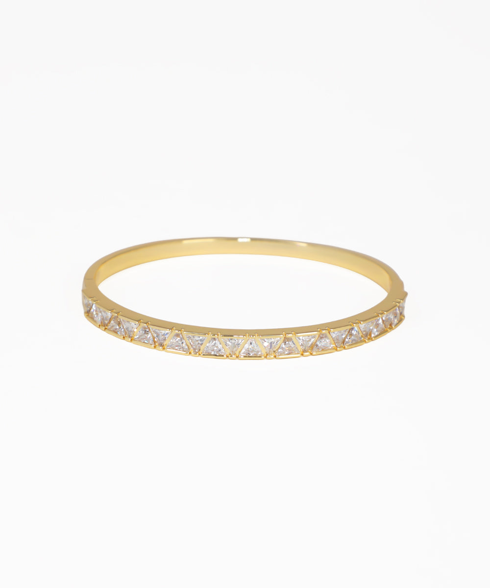 Gold-tone bangle kada with clear triangular stones on half band